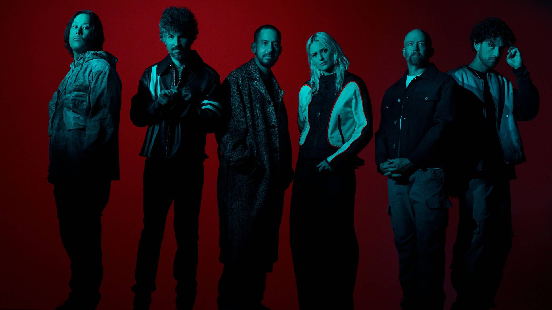 An image of rock band Linkin Park standing on a red and black background