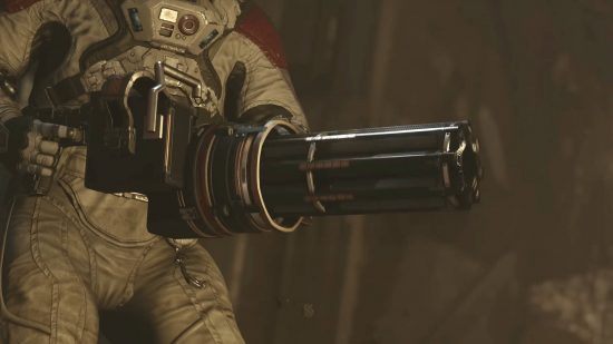 The Microgun is the Starfield guns equivalent of a minigun. The player is wearing a spacesuit as they rev up the gun's rotating barrel.