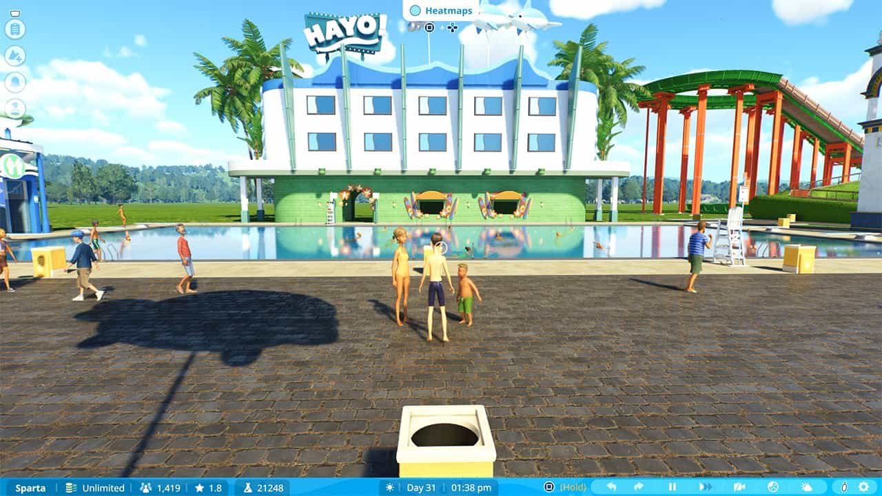 Guests in Planet Coaster 2 enjoying a swimming pool