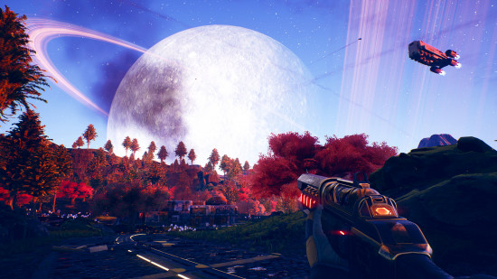 Best space games: a view of Saturn from a red-dyed planet in The Outer Worlds